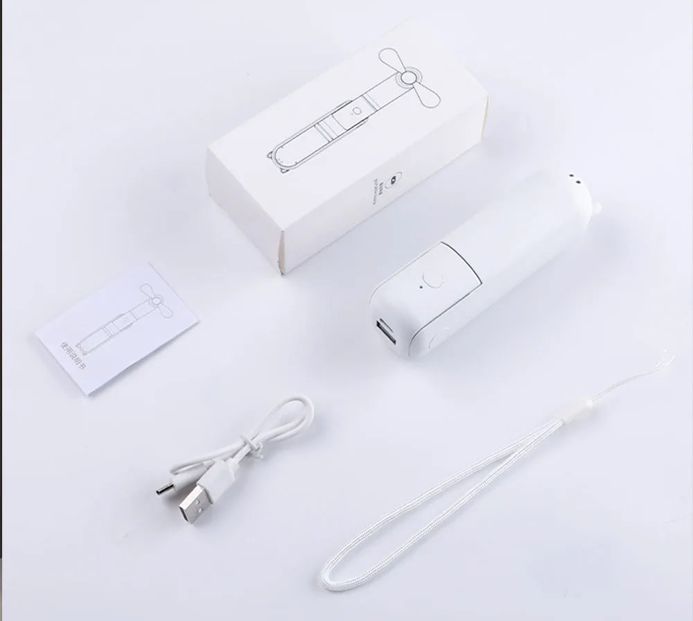 Foldable portable fan with USB charging cable, instruction card, and retail box