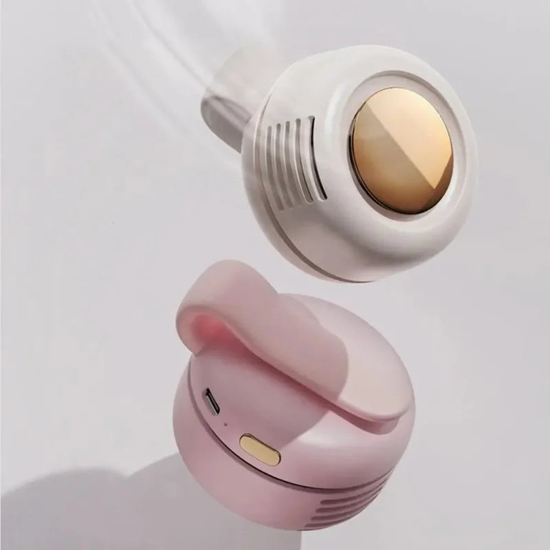 Pink bladeless waist fan with circular gold intake and side vent slots