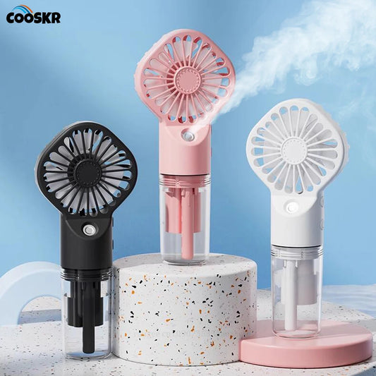 Pink handheld portable mist fan with detachable water tank and round grille