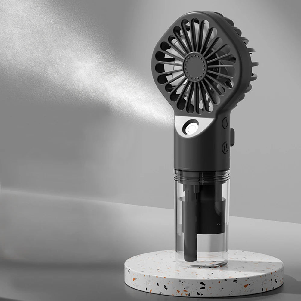 Handheld mist fan, black body with water-spray nozzle and circular mist fan head