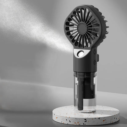 Handheld mist fan, black body with water-spray nozzle and circular mist fan head