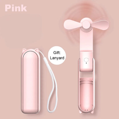 Pink foldable portable fan with three-blade head and included lanyard