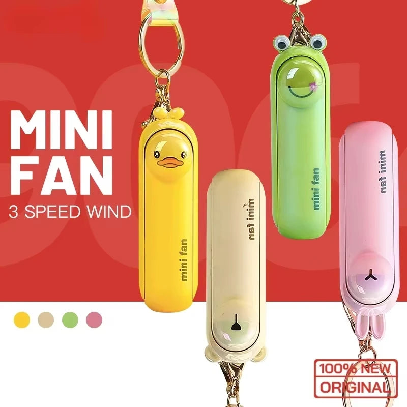 Mini handheld keychain fan, shown in multiple colors with 3-speed wind design.