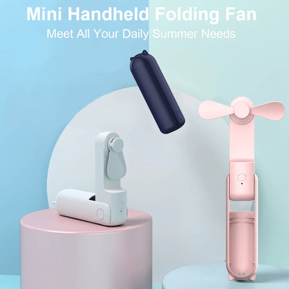 Navy and pink mini handheld folding fans with three-blade heads