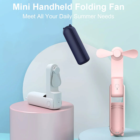 Navy and pink mini handheld folding fans with three-blade heads